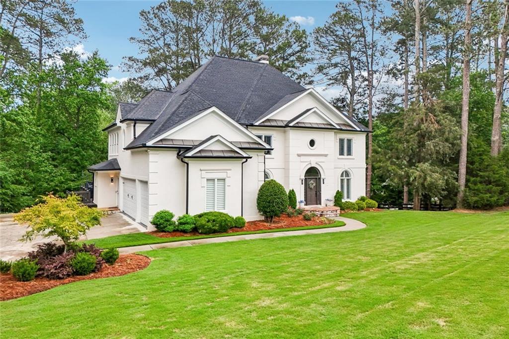 1091 Fieldstone Trail Milton, GA 30004 - Photo 2 of 84 a front view of house with yard and green space