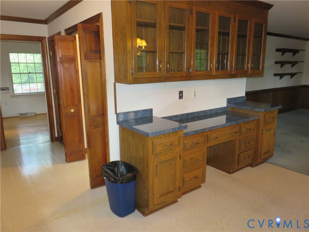 8379 Quailfield Road Mechanicsville, VA 23116 - Photo 24 of 56 a kitchen with stainless steel appliances granite countertop a stove and a refrigerator
