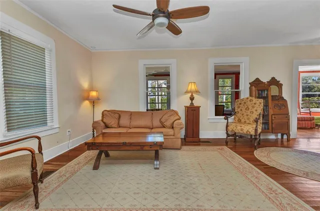 a living room with furniture and a window