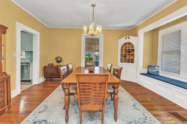 a kitchen with stainless steel appliances a refrigerator sink and microwave