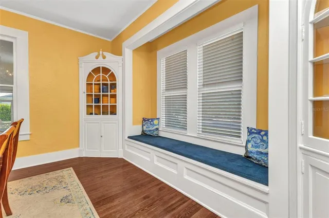 a bathroom with a sink and a curtain