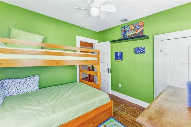 a view of a house with backyard and porch