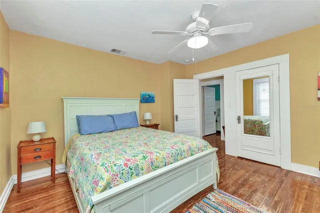 an aerial view of residential houses with outdoor space and swimming pool