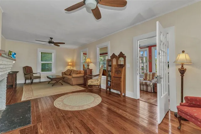a living room with furniture and a window