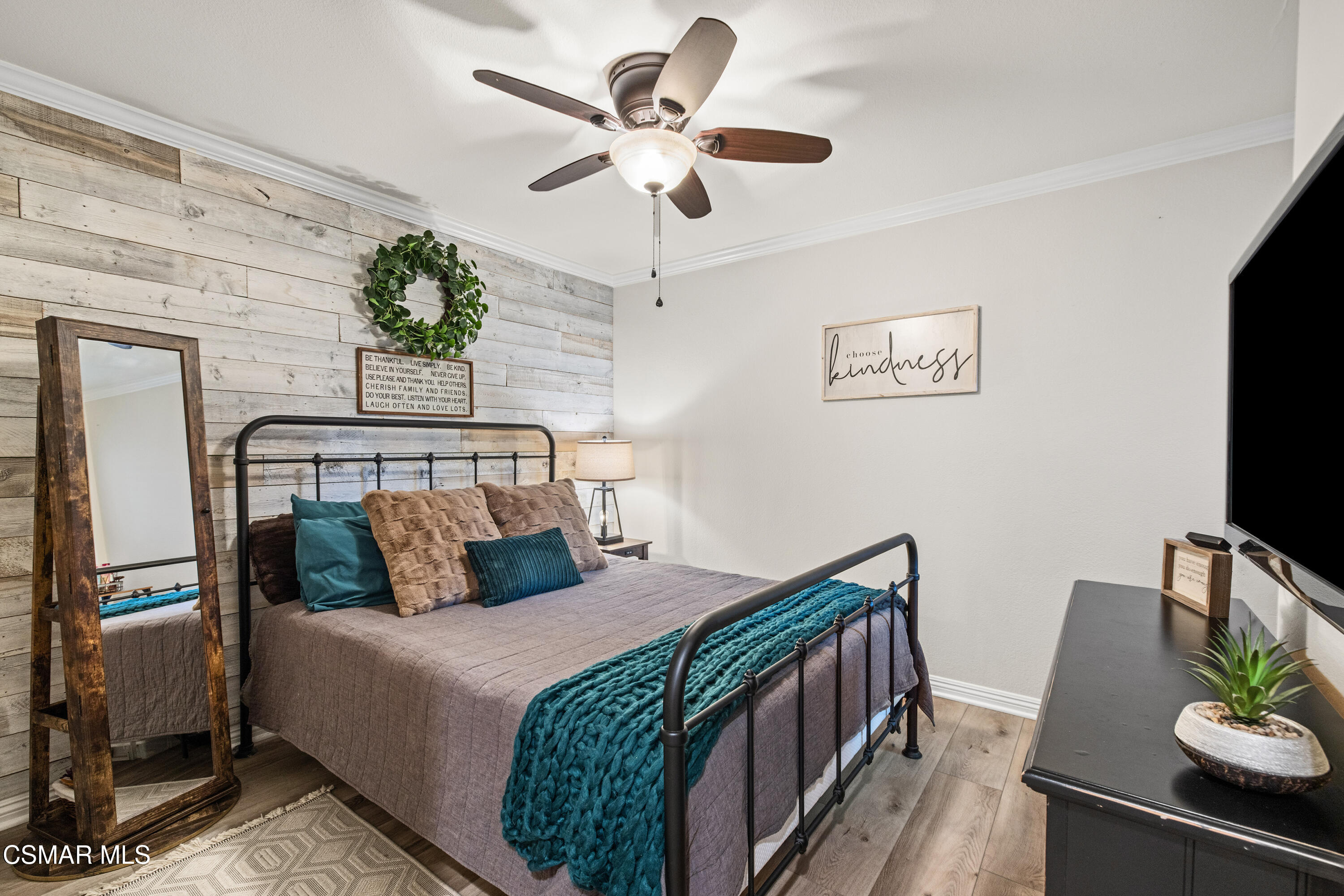 5200 Prairieview Street Camarillo, CA 93012 - Photo 12 of 24 a bedroom with bed and a chandelier