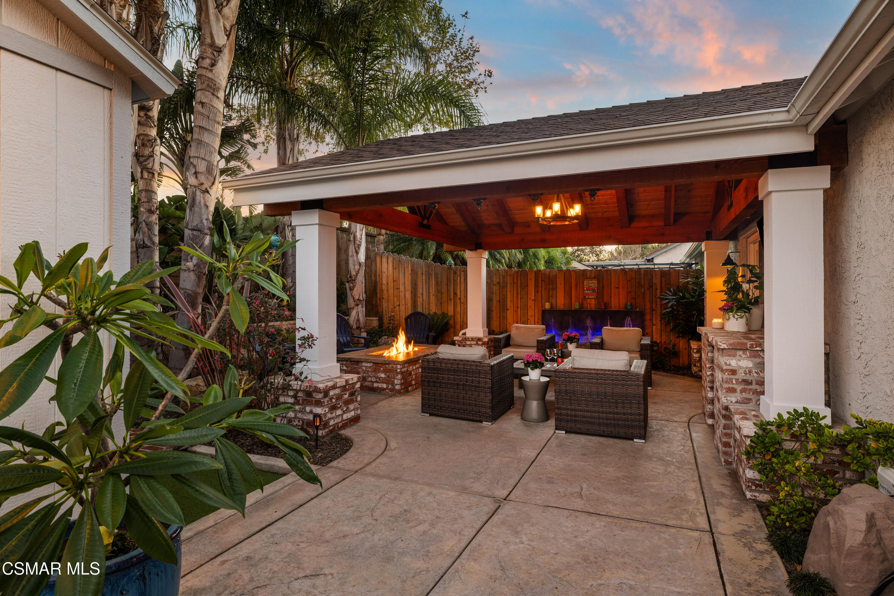 5200 Prairieview Street Camarillo, CA 93012 - Photo 20 of 24 a view of the patio with chairs and potted plants