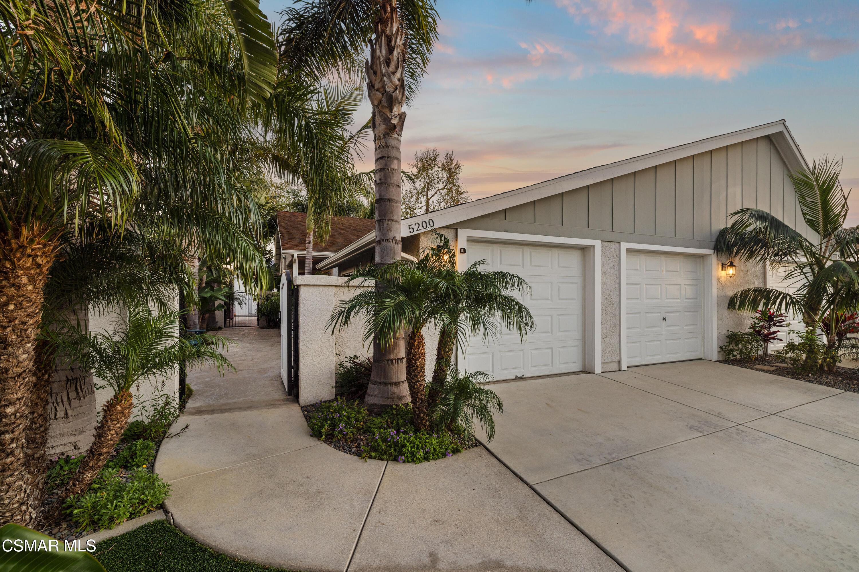 5200 Prairieview Street Camarillo, CA 93012 - Photo 2 of 24 a couple of palm trees in front of house