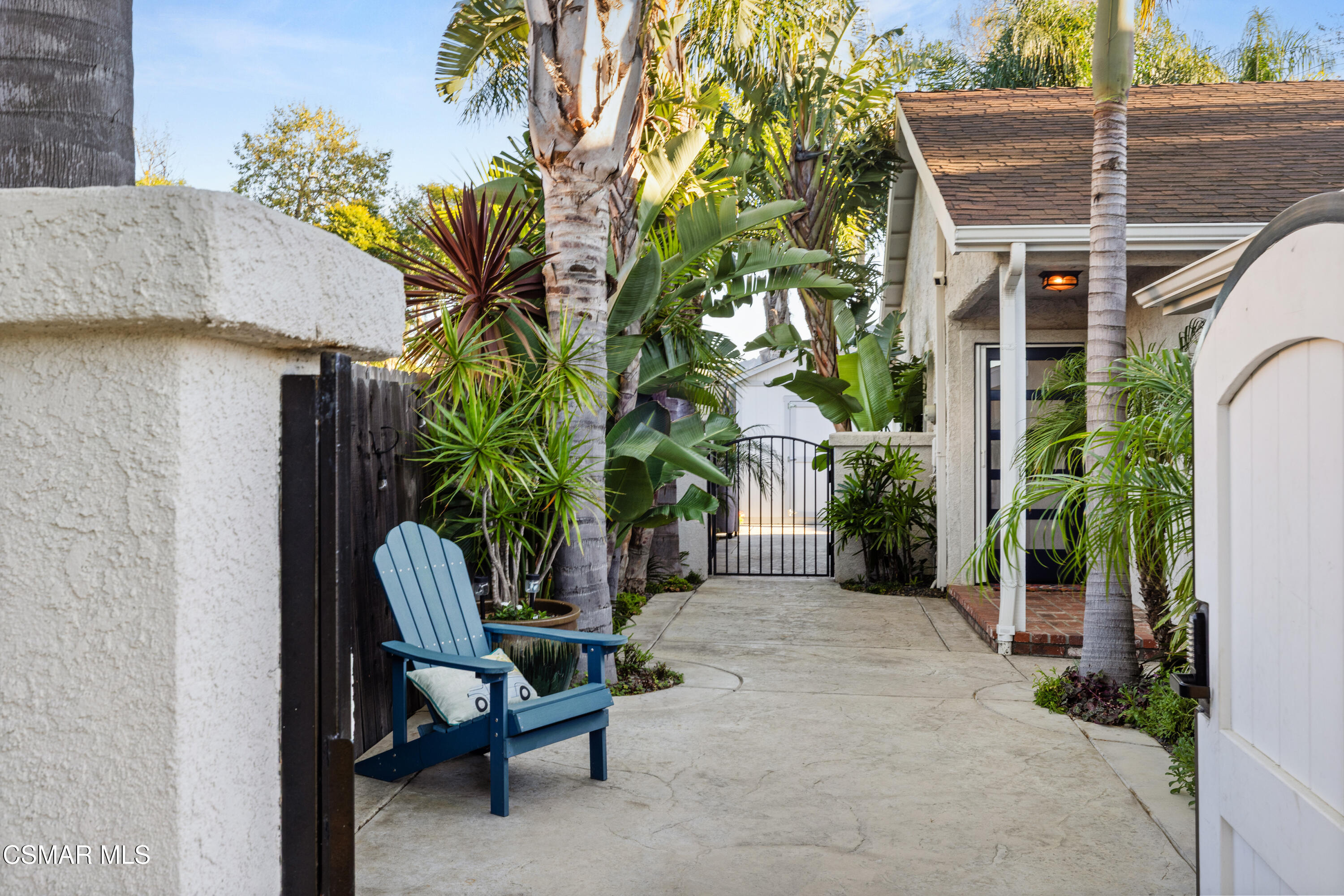 5200 Prairieview Street Camarillo, CA 93012 - Photo 3 of 24 a view of a chair and table in backyard of the house