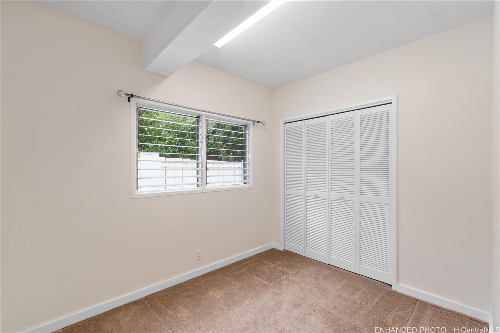 385 Kuliouou Road, Unit A Honolulu, HI 96821 - Photo 13 of 25 an empty room with windows