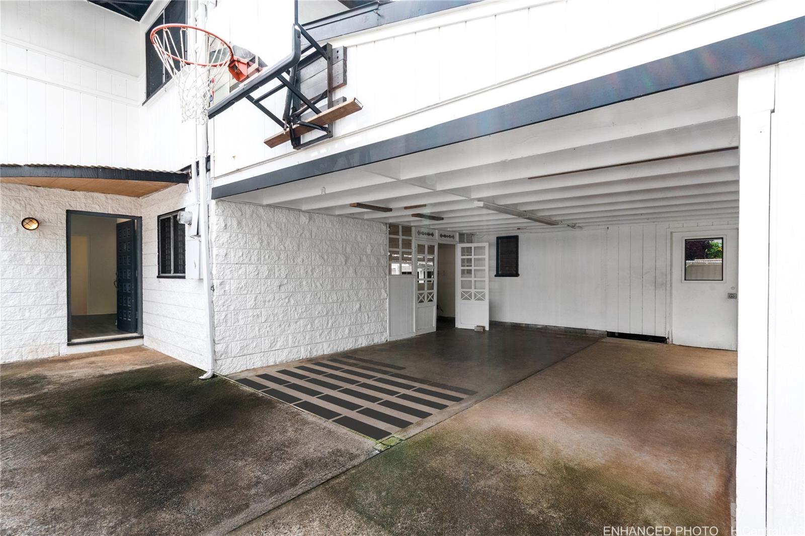 385 Kuliouou Road, Unit A Honolulu, HI 96821 - Photo 2 of 25 a view of a porch with a floor to ceiling windows