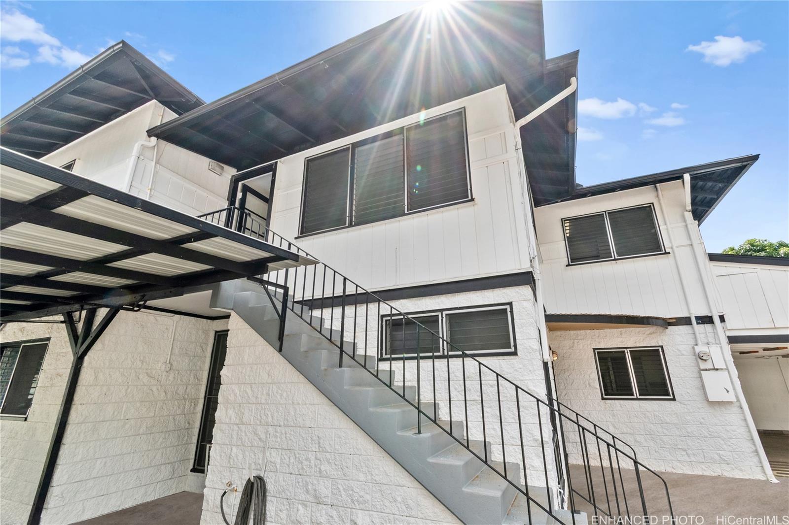 385 Kuliouou Road, Unit A Honolulu, HI 96821 - Photo 22 of 25 a view of a house with a balcony