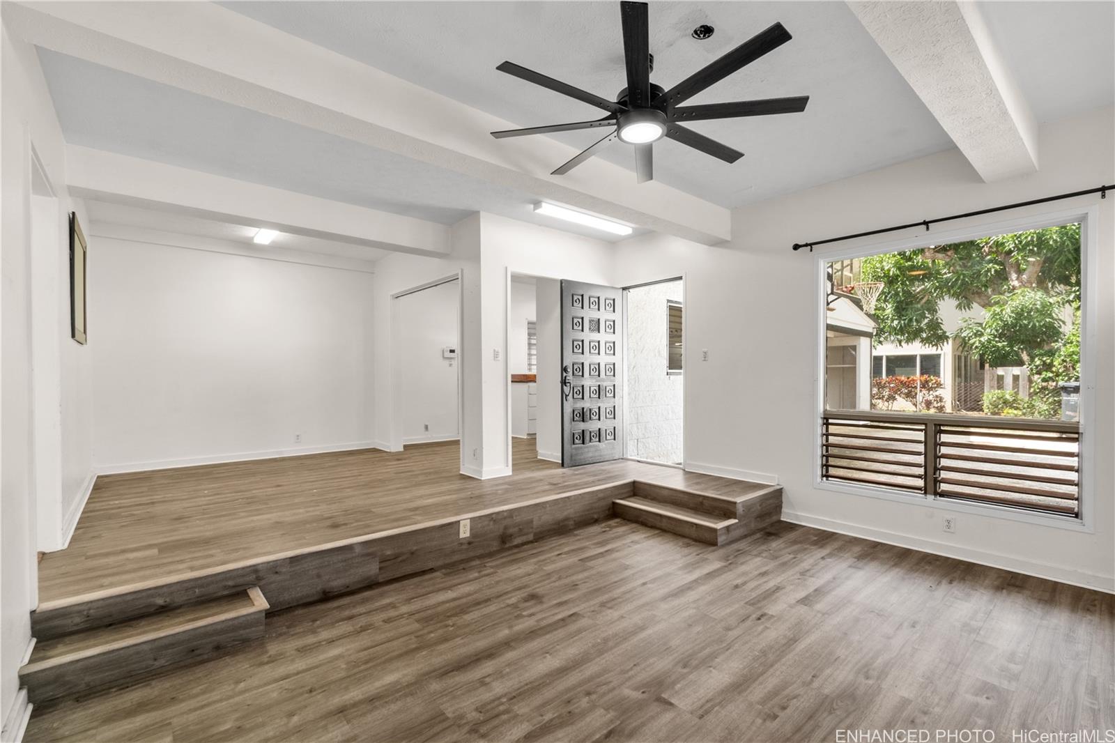 385 Kuliouou Road, Unit A Honolulu, HI 96821 - Photo 7 of 25 wooden floor in an empty room with a window