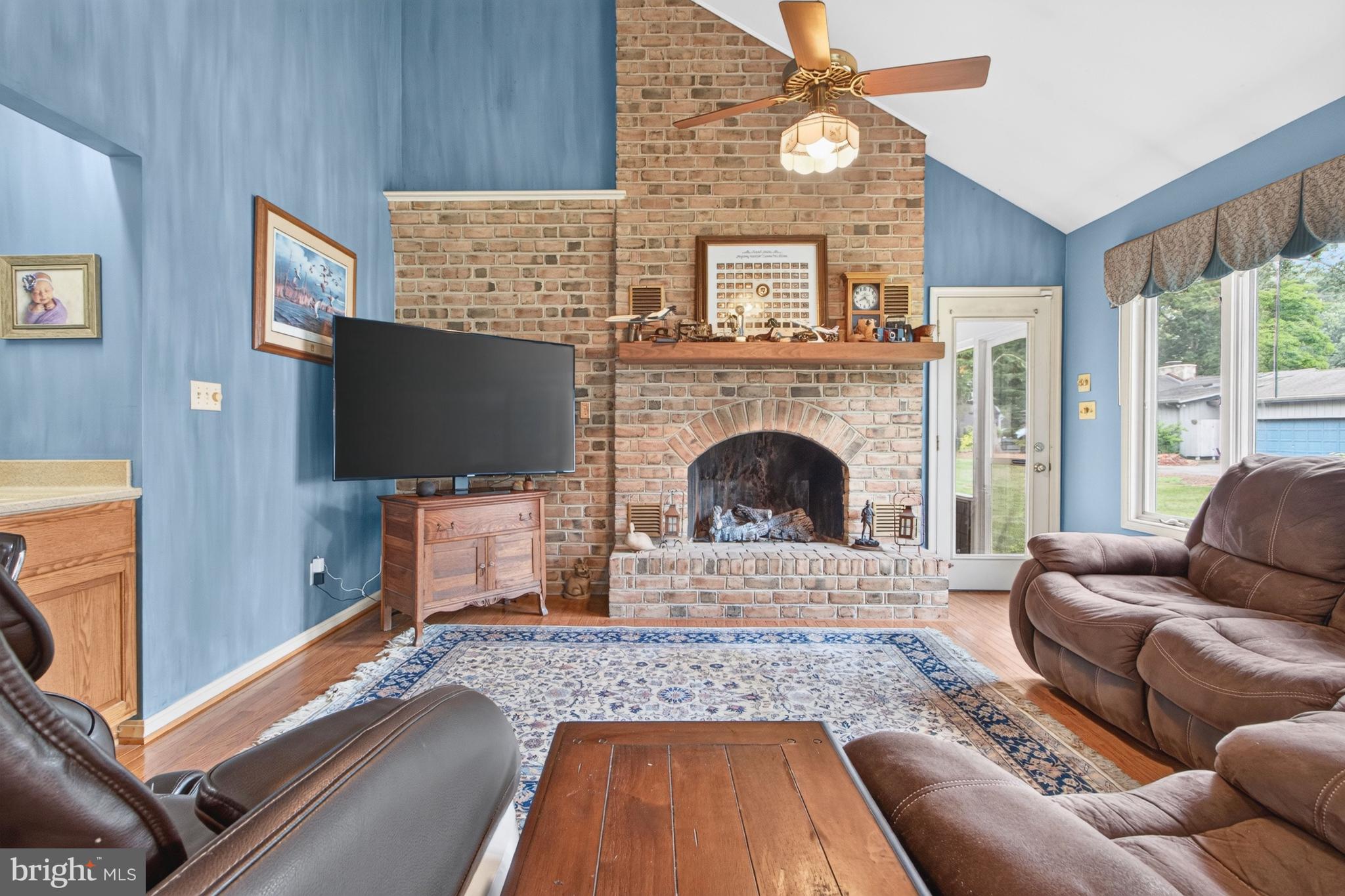 21 Cardiff Road Rehoboth Beach, DE 19971 - Photo 25 of 68 Family room w/brick fireplace