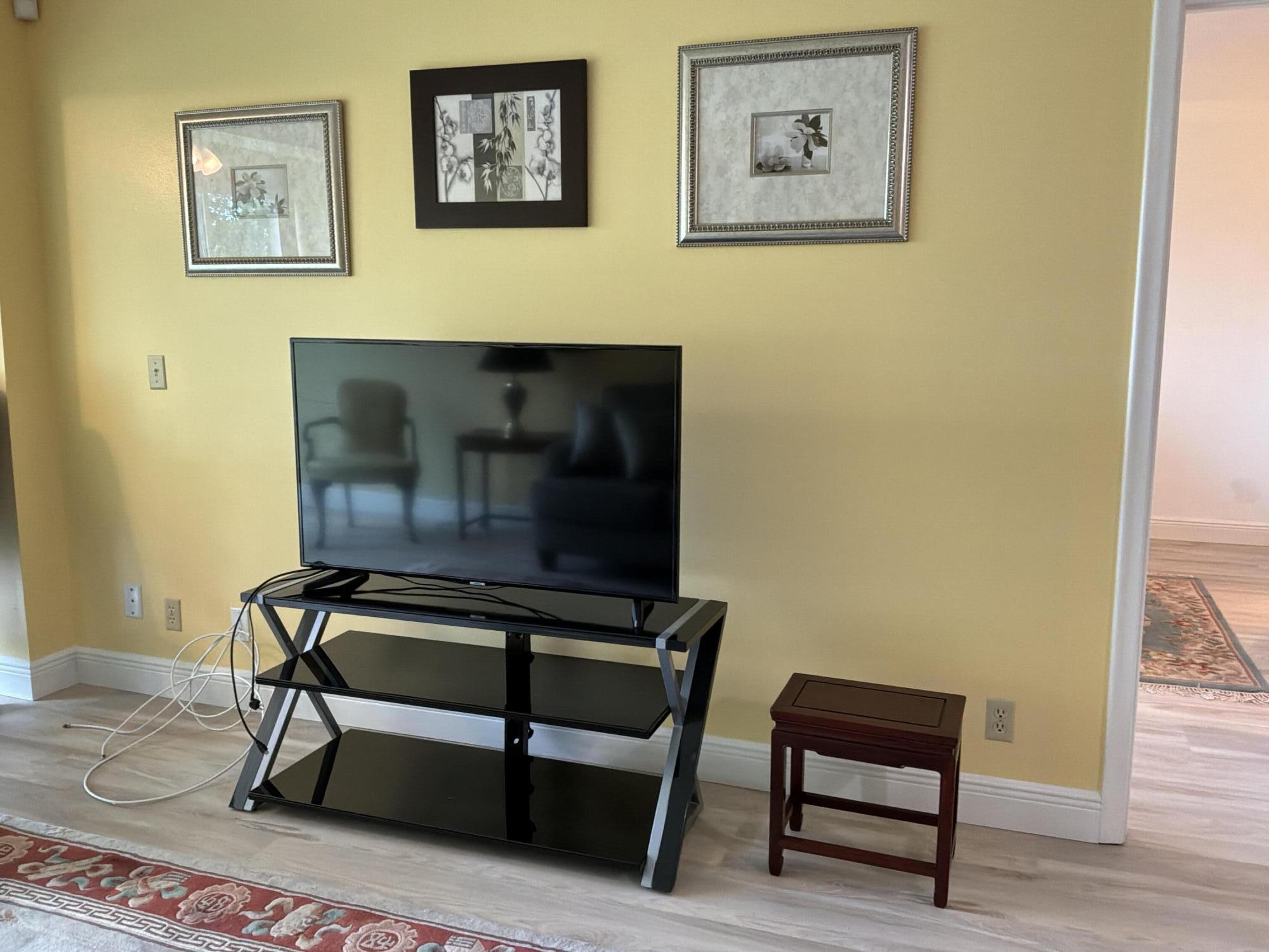 1121 Cactus Terrace, Unit 202 Delray Beach, FL 33445 - Photo 16 of 31 a view of a workspace with furniture