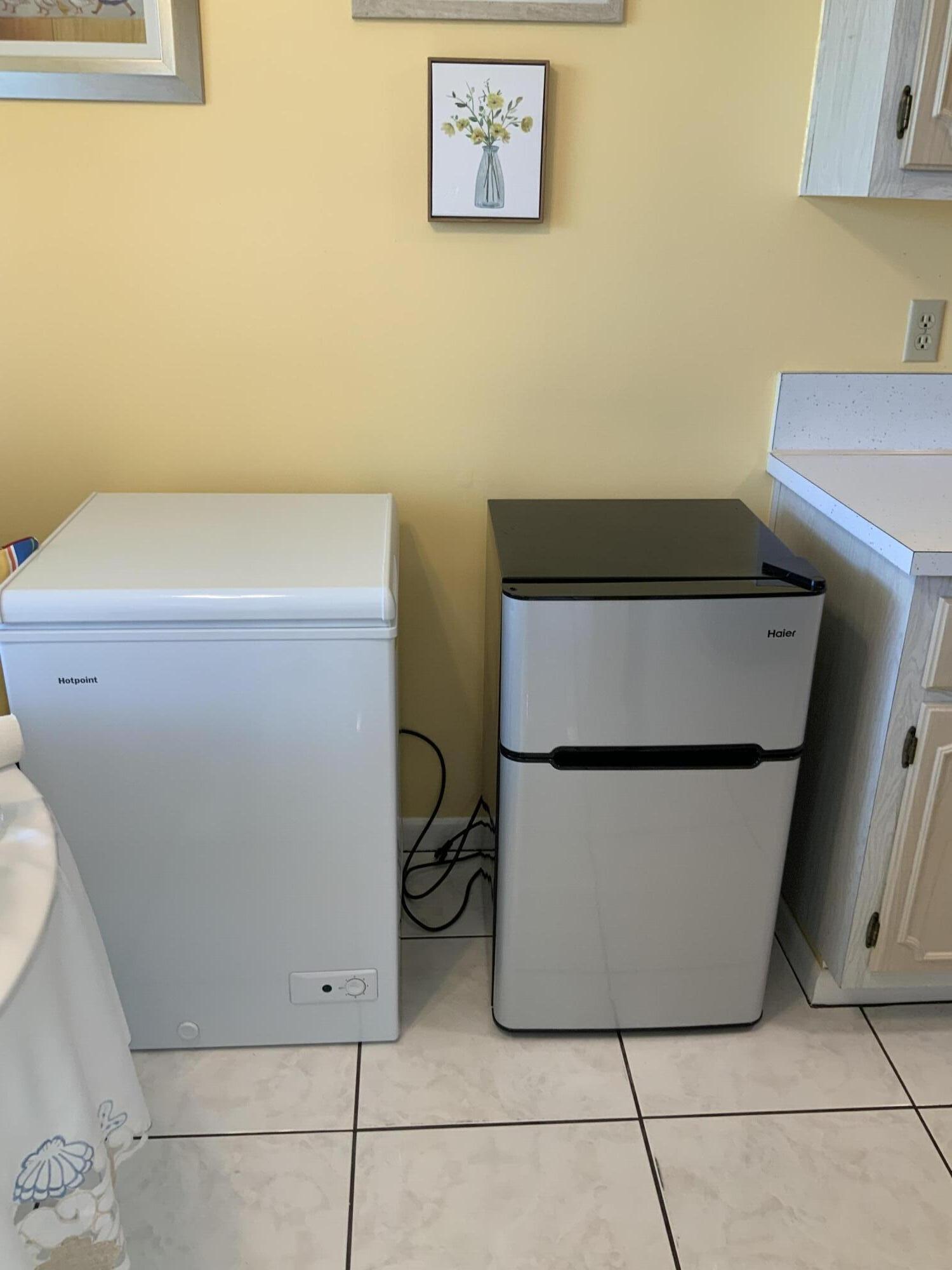 1121 Cactus Terrace, Unit 202 Delray Beach, FL 33445 - Photo 23 of 31 a utility room with dryer and washer