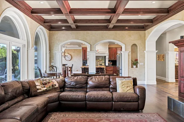 a kitchen with a sink appliances and cabinets