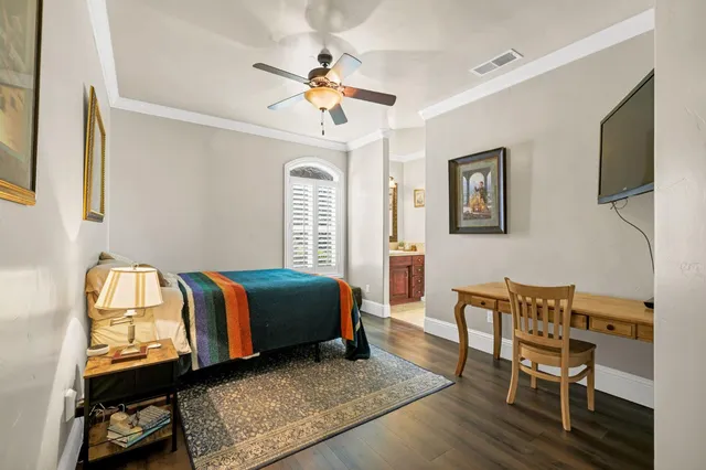 a bathroom with a sink double vanity and a mirror