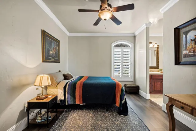 a bathroom with a toilet sink and shower