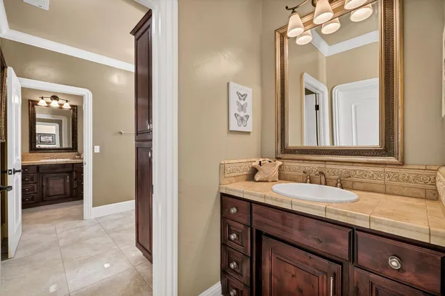 a bedroom with a bed and a fireplace