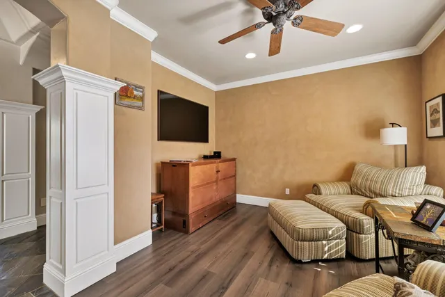 a spacious bathroom with a vanity a sink a mirror and bathtub
