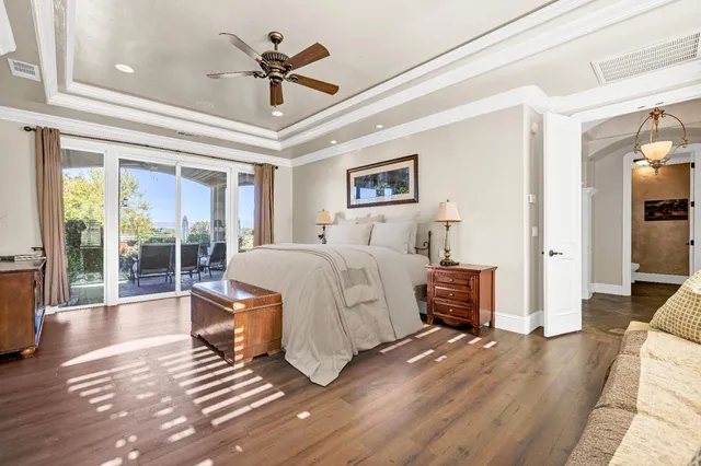 a view of a swimming pool with a lounge chair