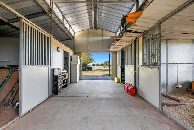 a view of a swimming pool with a yard