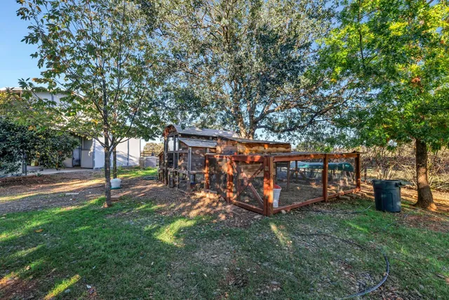 an aerial view of residential building with parking space