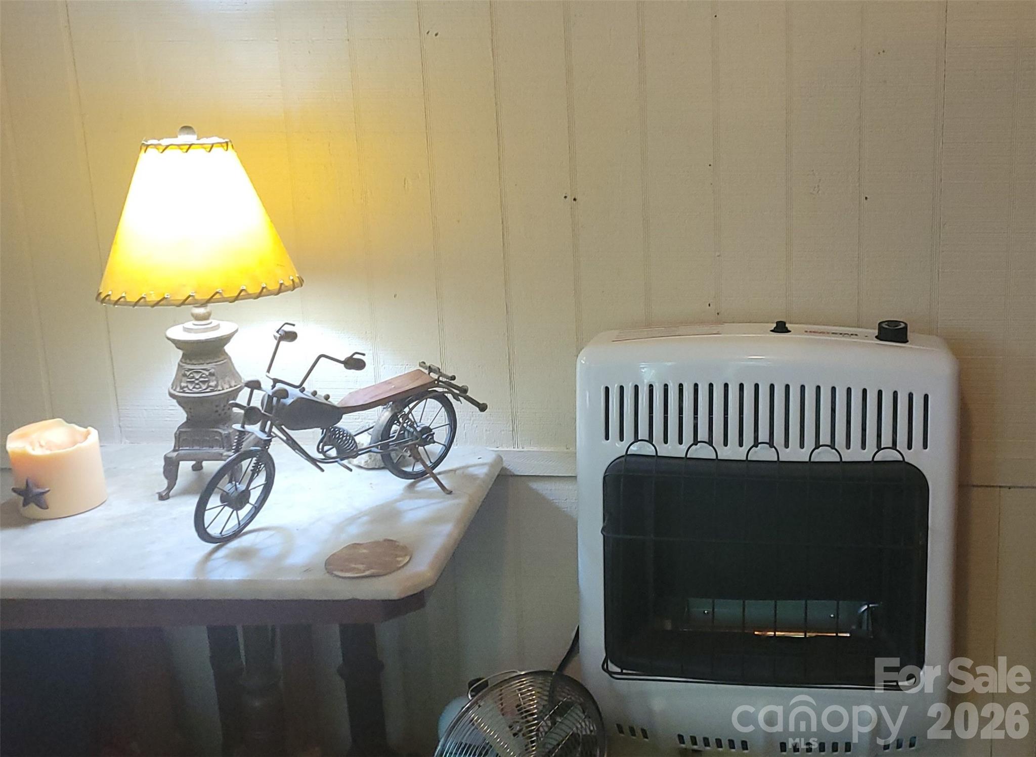 376 Hoot Owl Road Spruce Pine, NC 28777 - Photo 34 of 34 a bedroom with a bed and a table