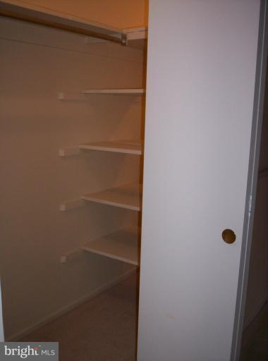 10026 Stedwick Road, Unit 101 Gaithersburg, MD 20886 - Photo 2 of 30 HUGE double closet off Dining Room