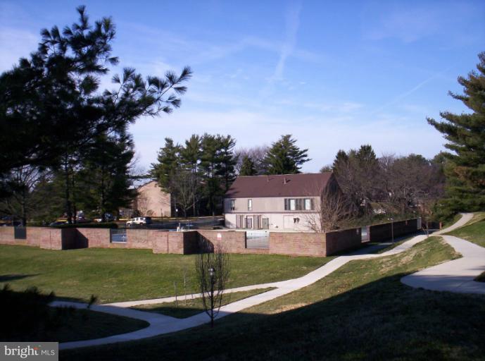 10026 Stedwick Road, Unit 101 Gaithersburg, MD 20886 - Photo 19 of 30 Paths to Pool and Heron's Cove Clubhouse.