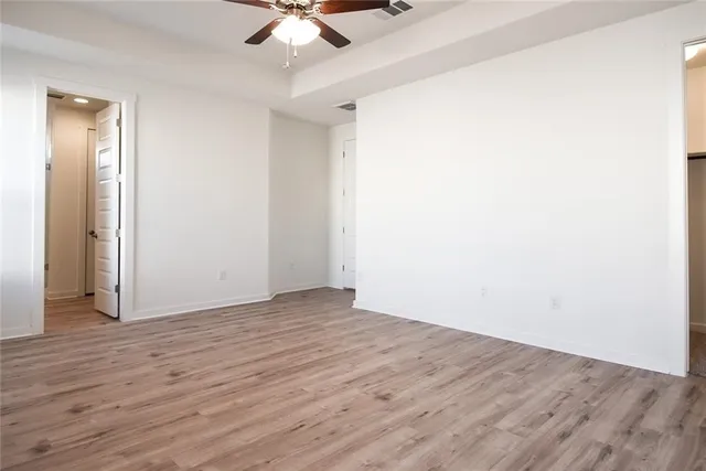 a bathroom with a shower sink and mirror