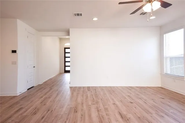 a view of kitchen with wooden floor
