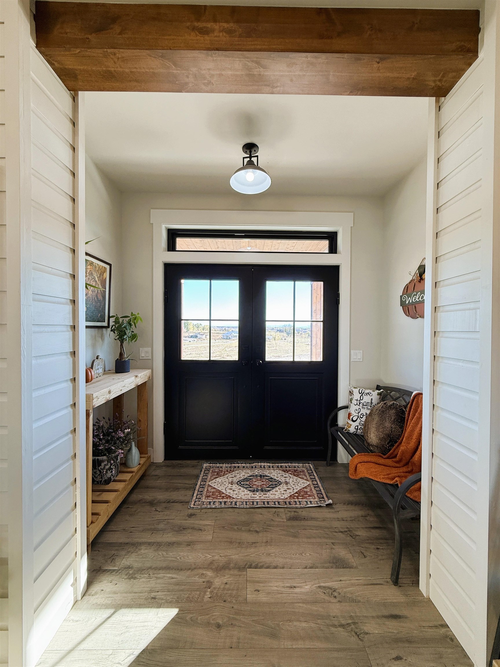 8585 Ellen's Way Austin, CO 81410 - Photo 11 of 42 a living room with furniture and a fireplace