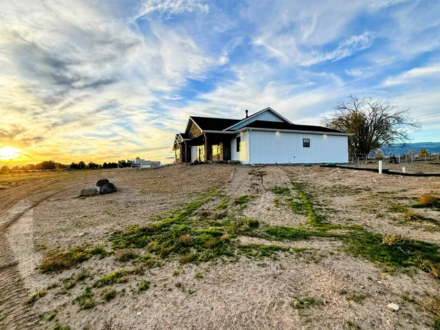 a front view of house with ocean view