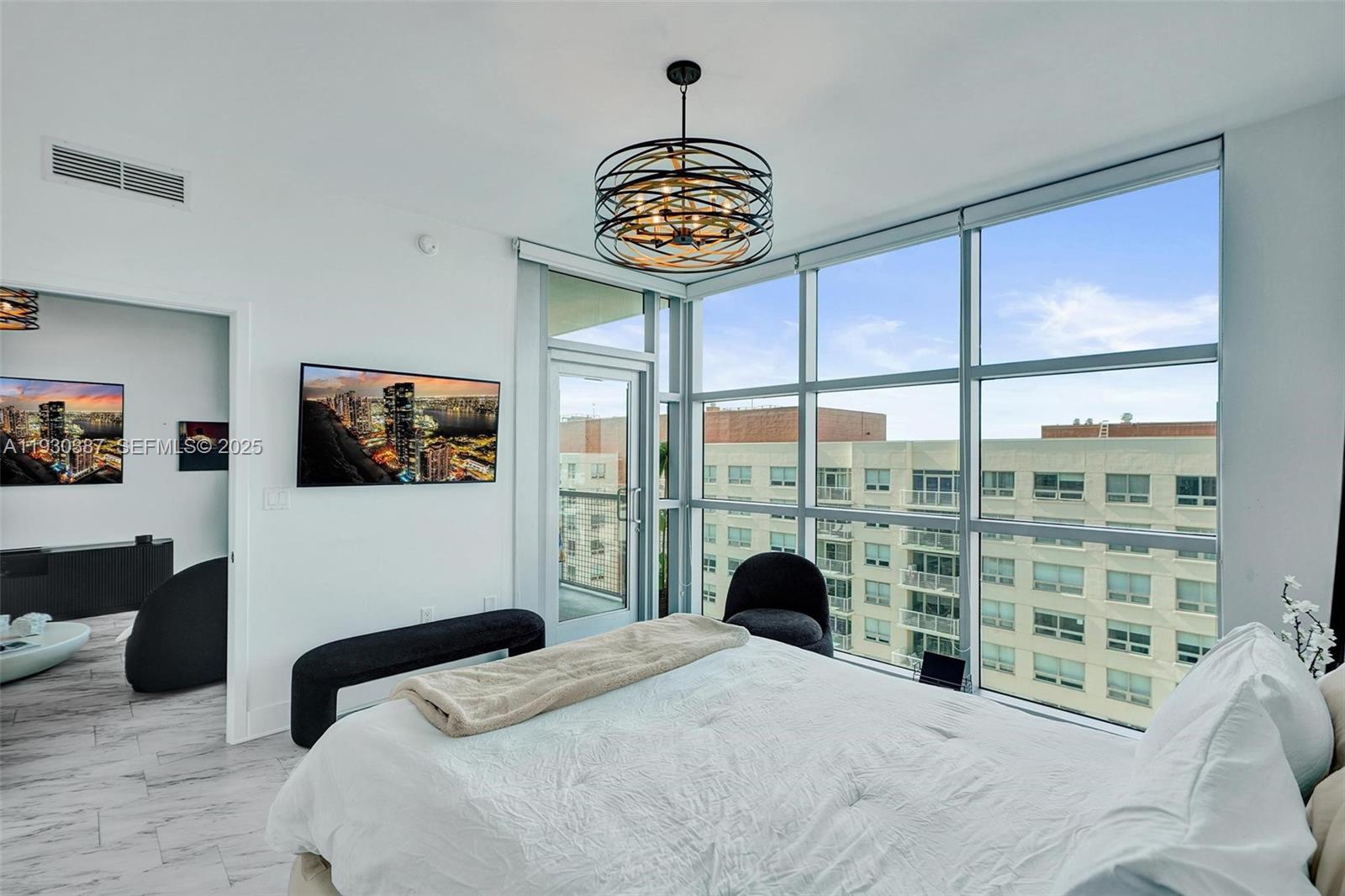 3301 Northeast 1st Avenue, Unit H1105 Miami, FL 33137 - Photo 8 of 34 a bedroom with a bed and a window