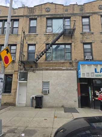 a view of a building with a street