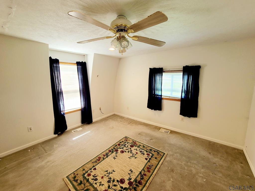 3160 Blue Goose Road Nicktown, PA 15762 - Photo 31 of 37 an empty room with windows and closet