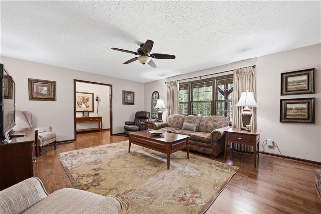 2575 Valleyhill Drive Acworth, GA 30102 - Photo 17 of 48 a living room with furniture and a large window