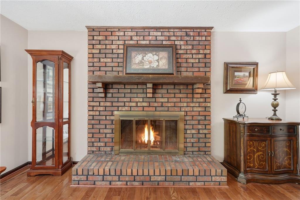 2575 Valleyhill Drive Acworth, GA 30102 - Photo 19 of 48 a living room with furniture and a fireplace