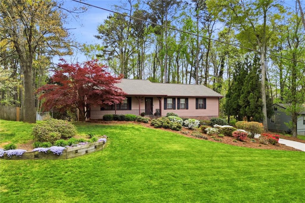 2575 Valleyhill Drive Acworth, GA 30102 - Photo 2 of 48 a front view of a house with garden
