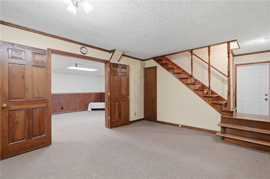 2575 Valleyhill Drive Acworth, GA 30102 - Photo 41 of 48 a view of an empty room with stairs