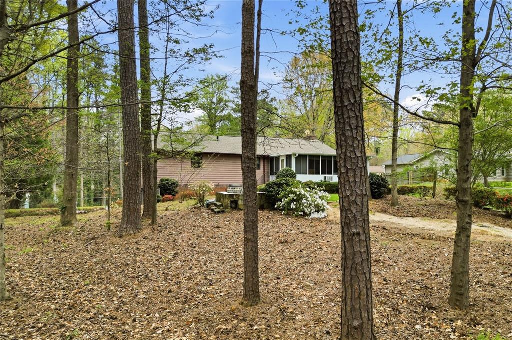 2575 Valleyhill Drive Acworth, GA 30102 - Photo 9 of 48 a view of a porch with a tree