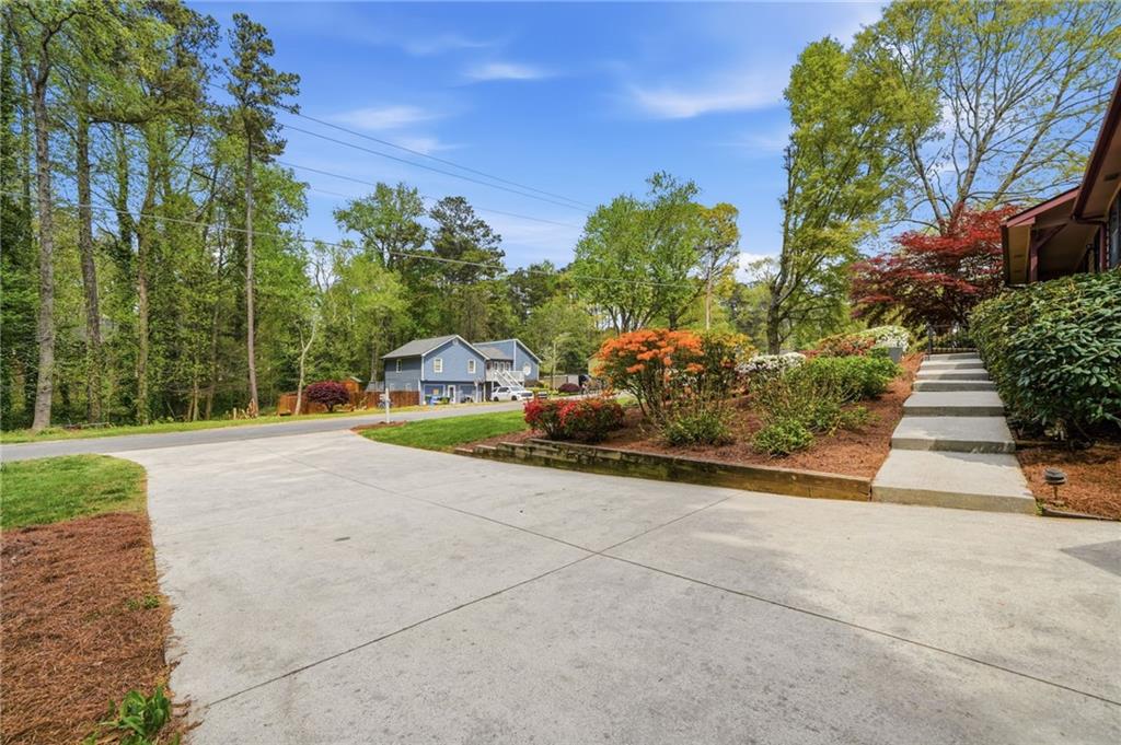 2575 Valleyhill Drive Acworth, GA 30102 - Photo 10 of 48 a view of a house with backyard and garden