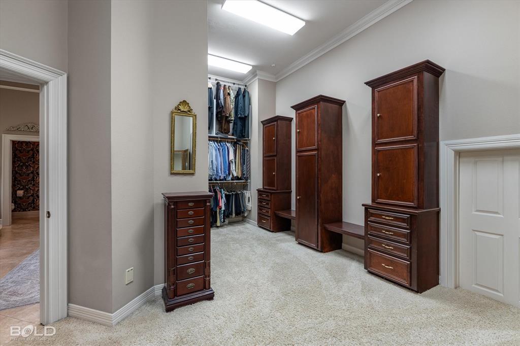 36 Golf Club Drive Haughton, LA 71037 - Photo 21 of 40 a view of room with walk in closet and bedroom