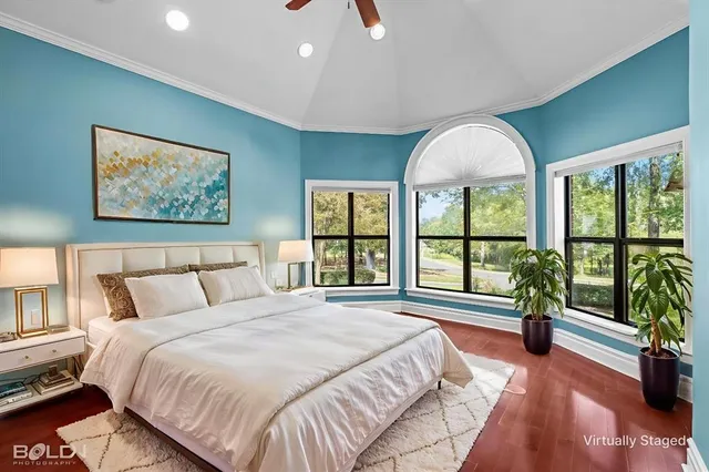 a view of room with walk in closet and bedroom