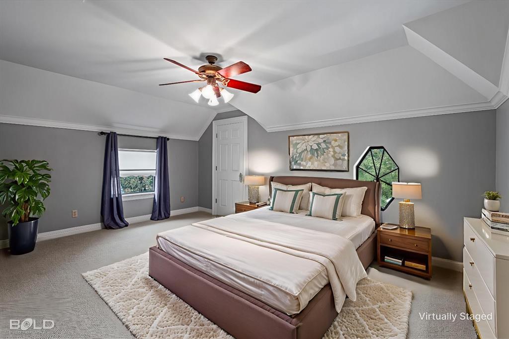 36 Golf Club Drive Haughton, LA 71037 - Photo 26 of 40 a bedroom with a bed and a chandelier
