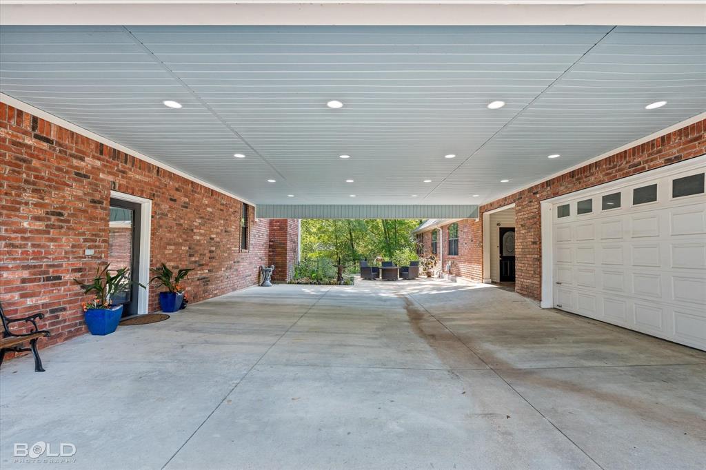 36 Golf Club Drive Haughton, LA 71037 - Photo 32 of 40 a view of a building with seating space