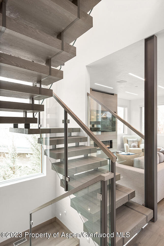 802 East Cooper Avenue, Unit 3 Aspen, CO 81611 - Photo 20 of 28 a view of entryway and hall with wooden floor