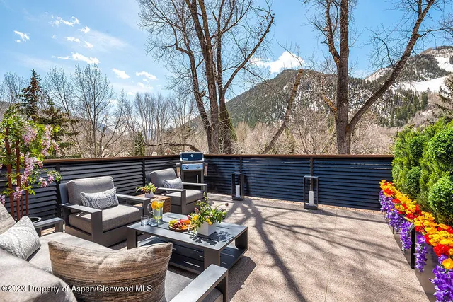 a outdoor living space with furniture and mountain view