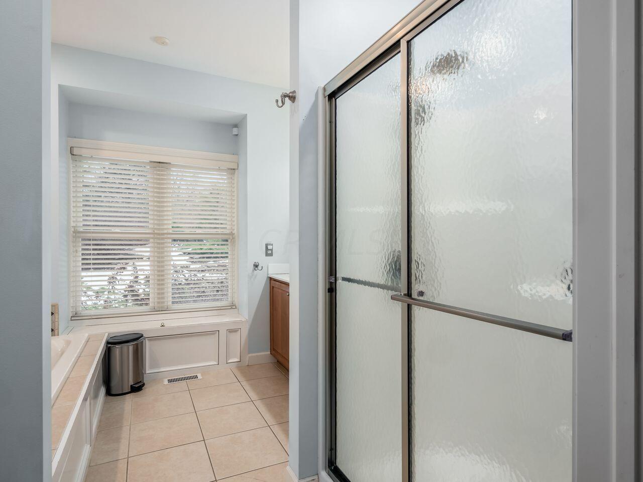 3737 Olentangy River Road Delaware, OH 43015 - Photo 26 of 70 Walk in shower and ceramic floors.